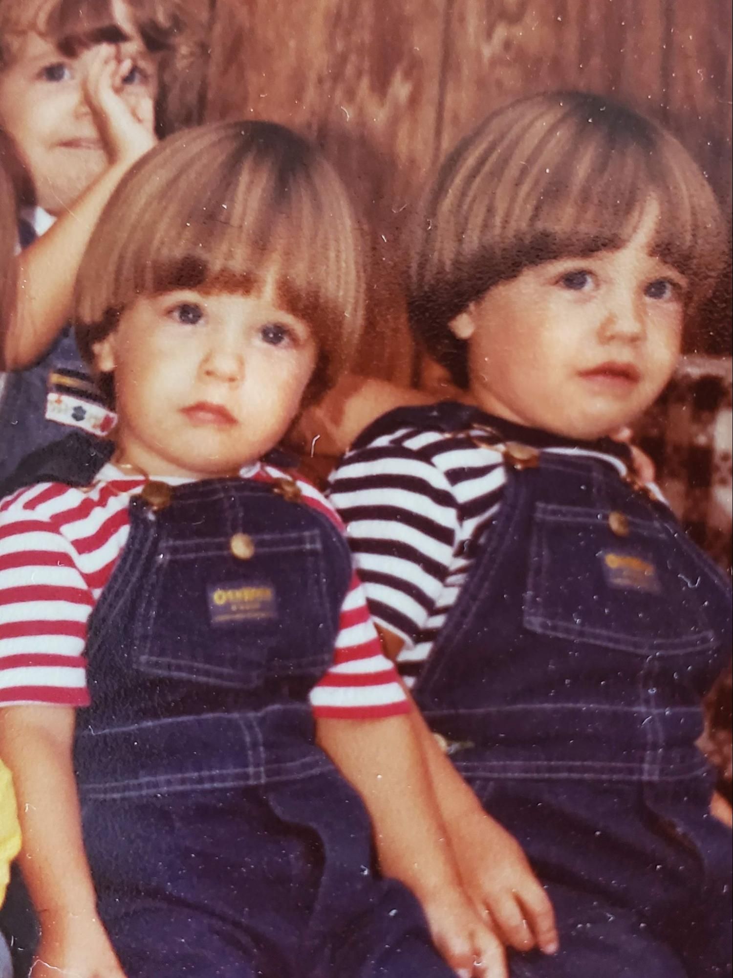Would you trust these two guys? Clearly, and their big sister Courtney, photo bombing the frame